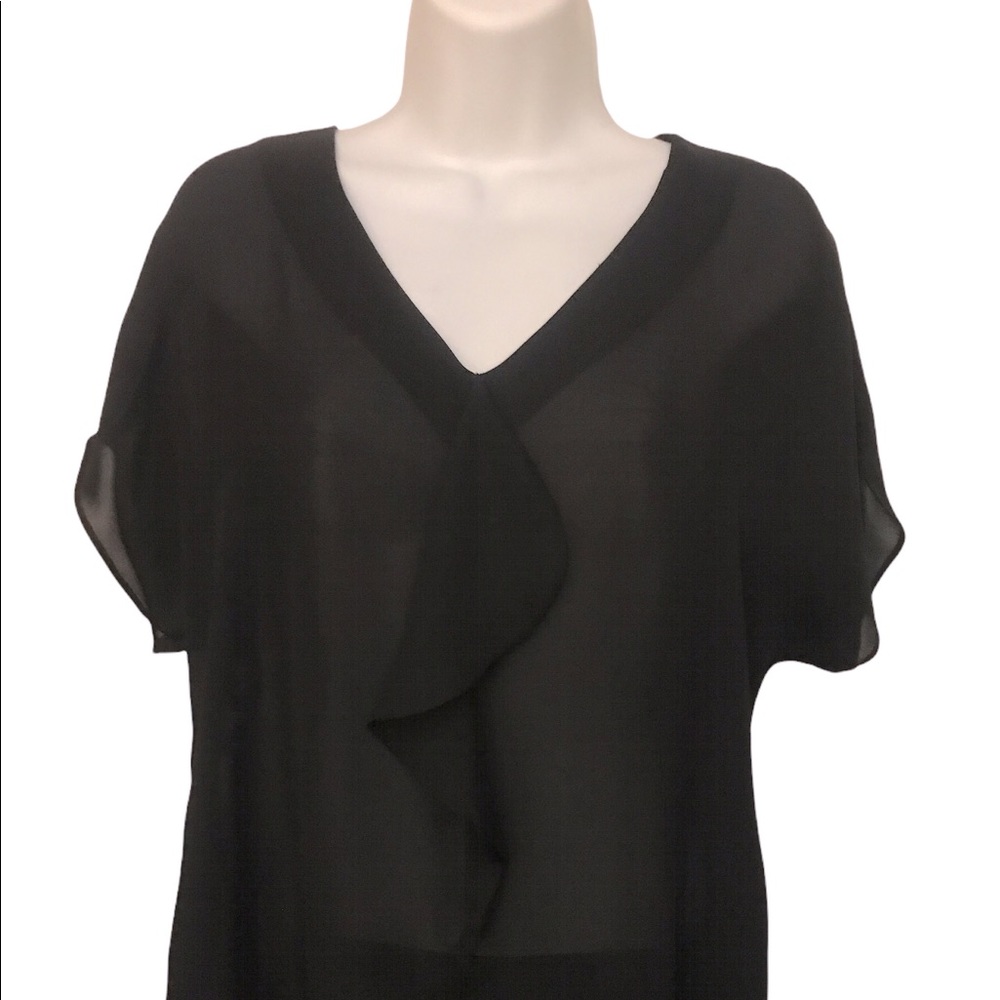 Loft black sheer top with decorative panel, thin elastic band at the bottom.